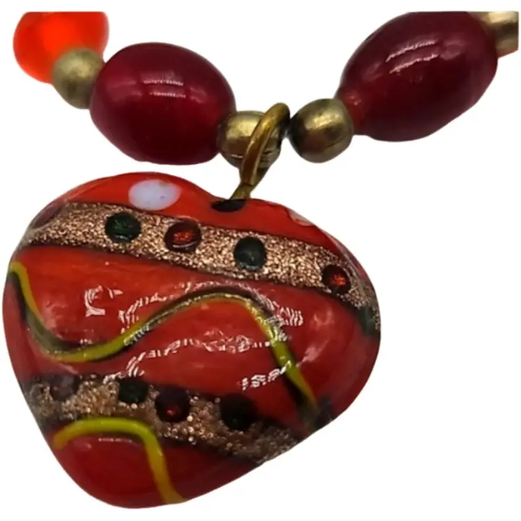 Art glass bracelet with heart pendant