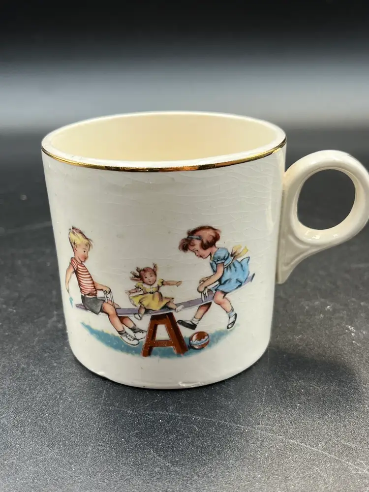 Vintage Child’s Cup- Teeter Totter