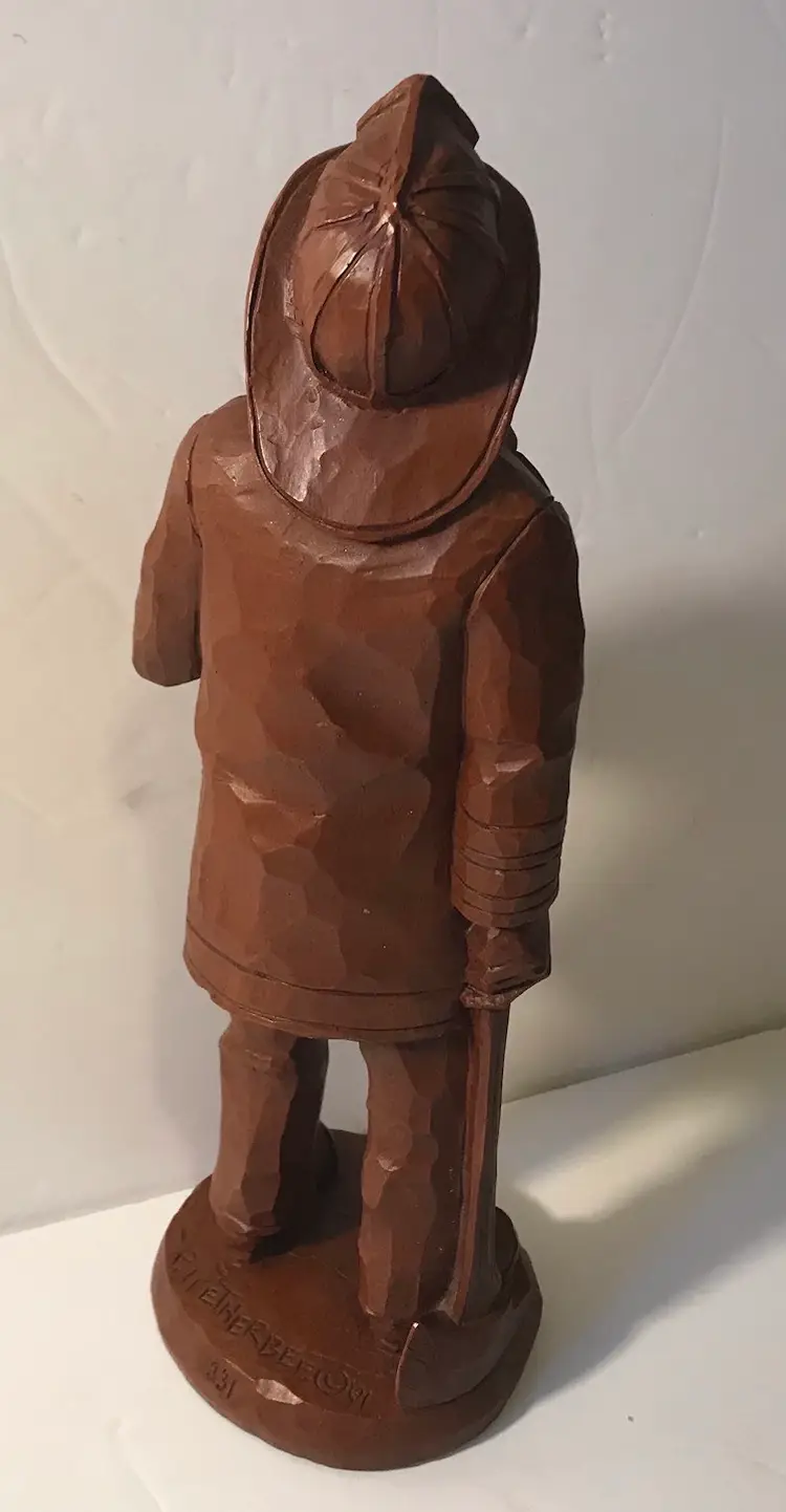 Red Mill Mfg 11 1/4” Firefighter with axe Figurine Signed R Wetherbee 1991