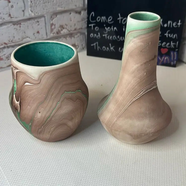 green and a light and dark brown pottery