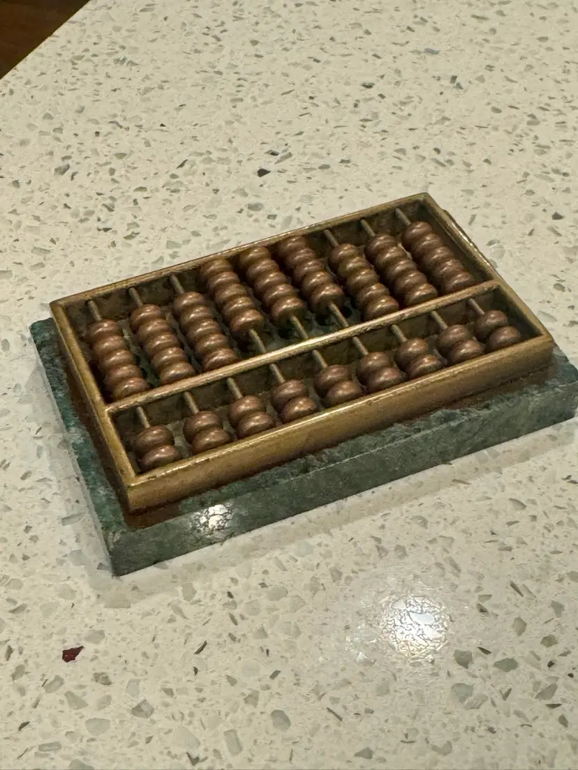 vintage miniature Chinese abacus calculator w/brass beads on a green marble base