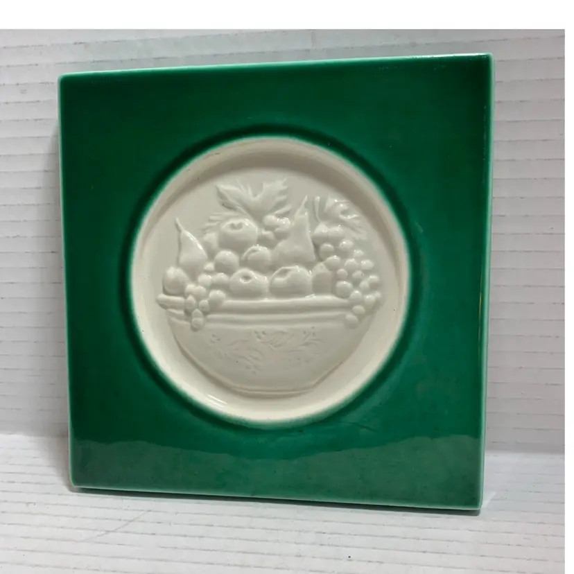 VTG Tile Trivet Embossed Fruit Basket Glossy Glaze Cork Back Green And White