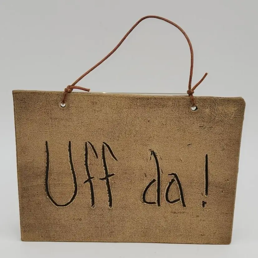 UFF DA!  Pottery Sign -
Scandinavian - A MINNESOTAN'S favorite saying next to "You betcha" Signed Tollefson 8"L x 6"H