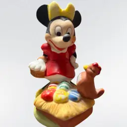 Vintage Minnie Mouse with Chicken colored eggs Ceramic Figurine
Disney 4"