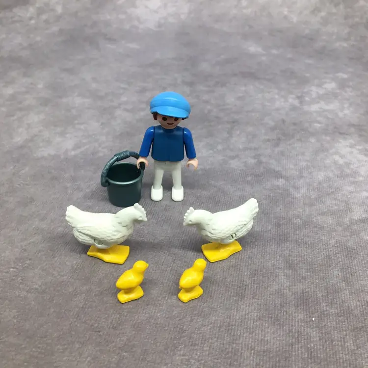 Playmobil Little Boy Feeding Chickens