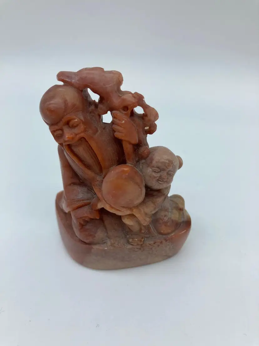 Red soapstone Chinese carving small, man/child