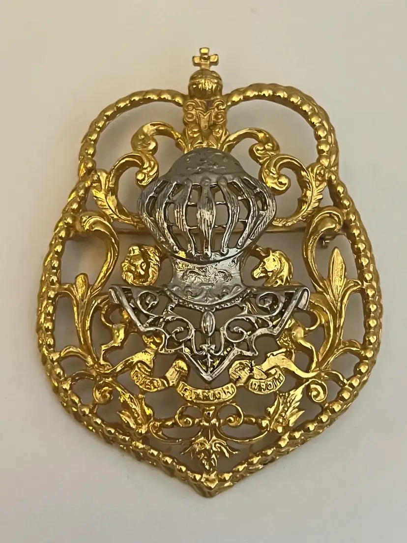 Vintage Arthur Pepper knight's shield of armor brooch.