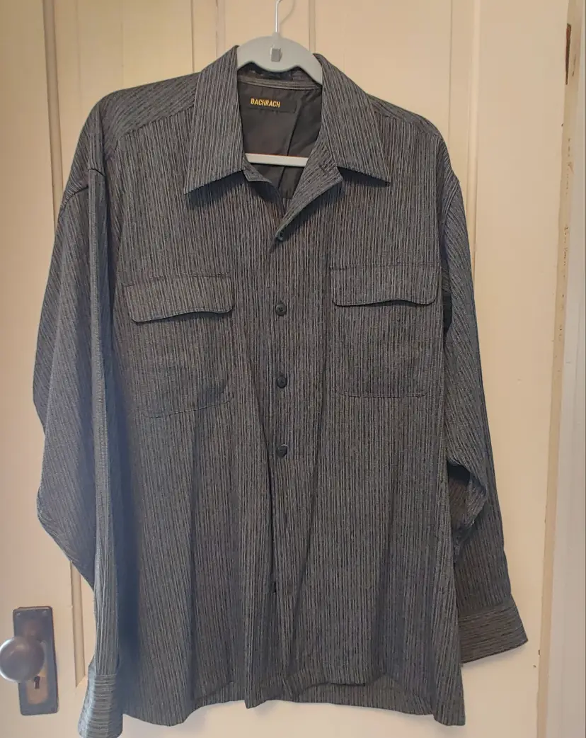 Men's Top- Brand: Bachrach. Size Large (16-16 1/2, 34-35). Black button down shirt with front pockets.. 51% rayon, 49% polyester. No callouts.