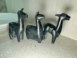 3 Vintage black stone hand-carved stone llama figurines, from Peru and in vintage condition.
