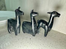 3 Vintage black stone hand-carved stone llama figurines, from Peru and in vintage condition.