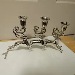 Silver reindeer candle holder. Great condition. Heavy.