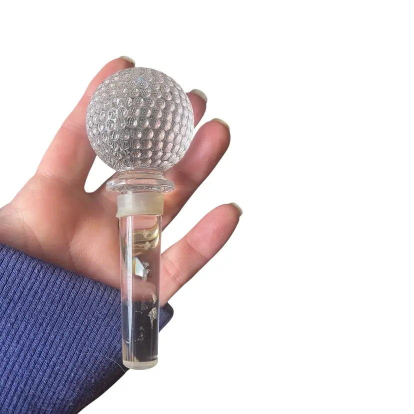 This is a Mikasa crystal golf ball wine bottle stopper from the "Tee Time" collection