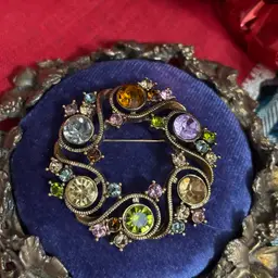 H-Vtg Monet Multi Colored Rhinestone Gold Tone Circular Brooch Marked