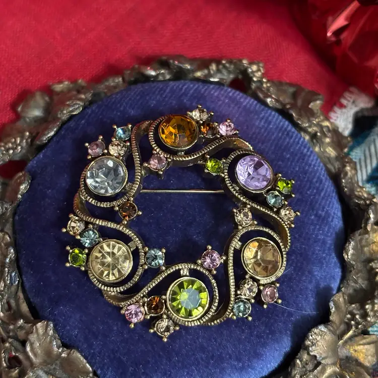 H-Vtg Monet Multi Colored Rhinestone Gold Tone Circular Brooch Marked