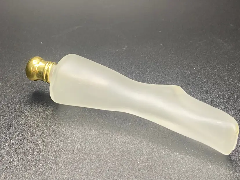 Leg Shaped Frosted glass perfume bottle designed by Stef Uiterwaal for Royal Leerdam,