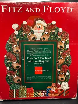 This Fitz and Floyd Christmas Holiday Frame features a festive design of Santa & Reindeers