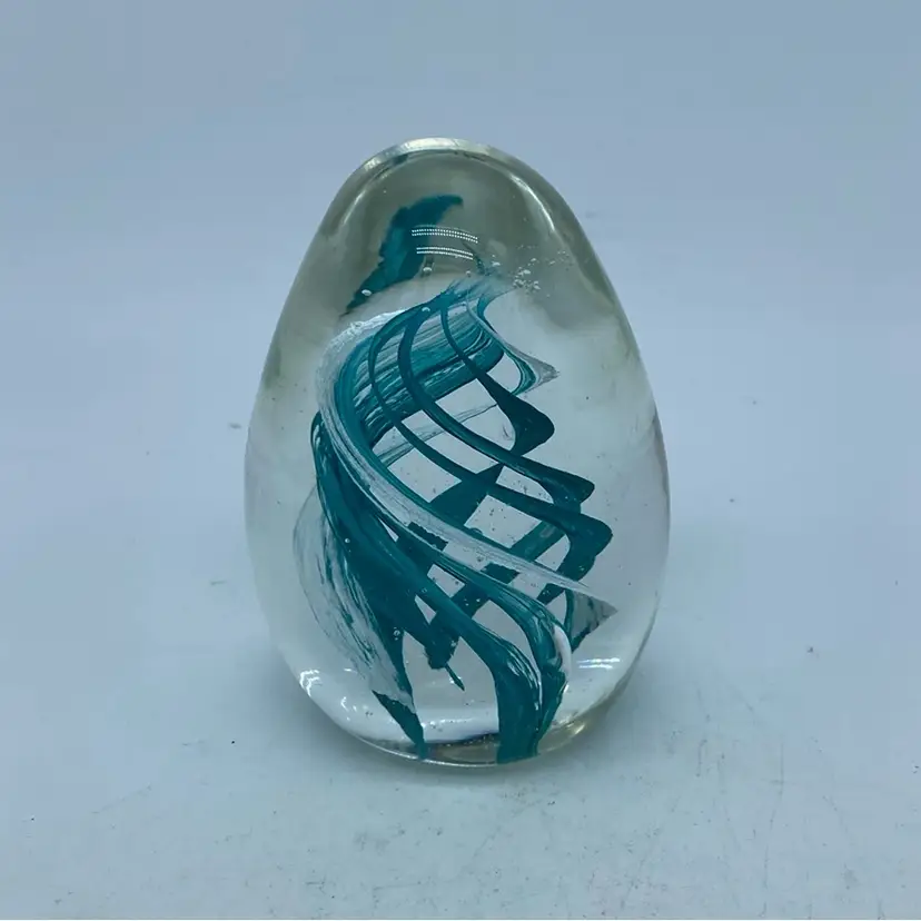 #0001 Vintage art glass egg-shaped paperweight with teal swirl 3.5” x 2.5”