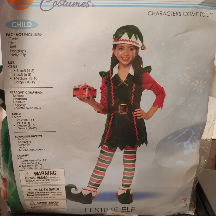 Child costume- Elf- Size medium 8-10. Includes- tunic, hat, belt, leggings and holly clip. New in bag.
