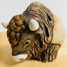 Handmade Carved Ceramic Buffalo Figurine Uruguay Signed Pottery Enamel Animal 3" tall and 3.5" by 2.5" wide.