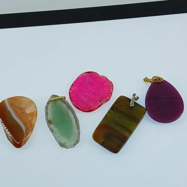 Five Sliced and Polished Gemstone Pendants
