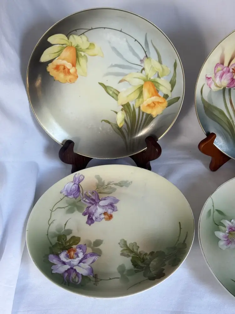 Set Of Four Antique Hand Painted Porcelain Plates, P.S.A.G Bavaria, Each Signed And Numbered; One Signed By Ragouse. Approx 7” Diameter.