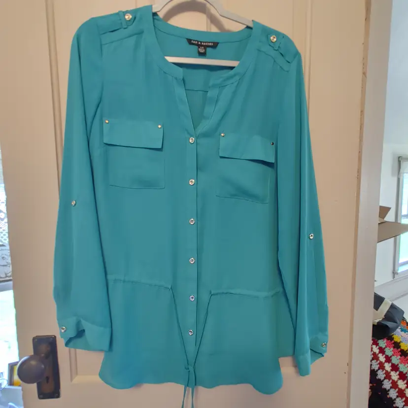 Top- Brand: Zac & Rachel. Size Large. Teal top. Material- Unknown. No callouts.
