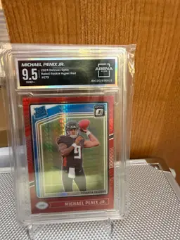 Michael Penix Jr. 2024 Donruss Optic Rated Rookie Hyper Red Arena Club 9.5