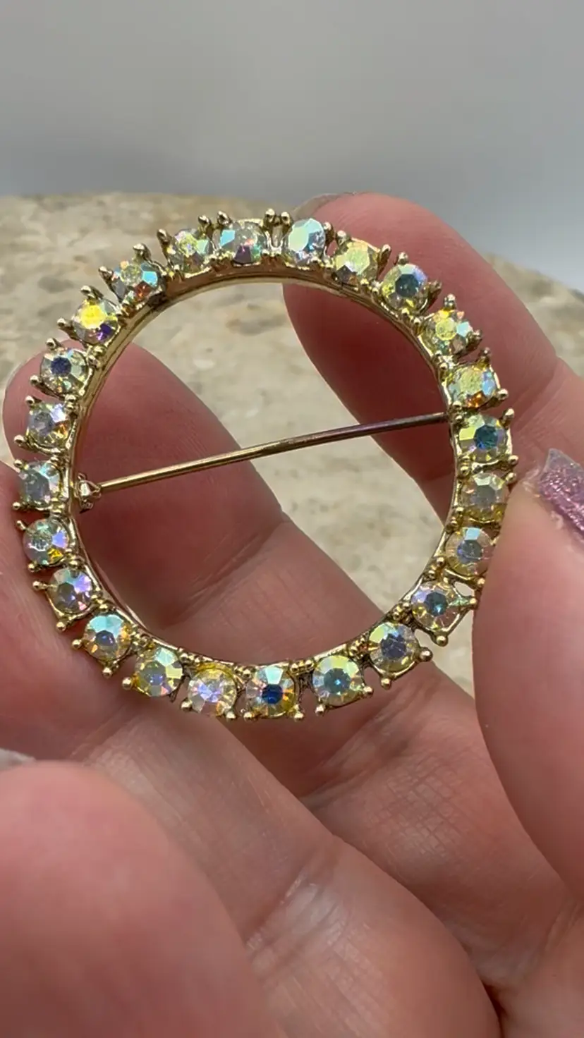 Vintage Gold Tone Circle Brooch With Aurora Borealis Rhinestones