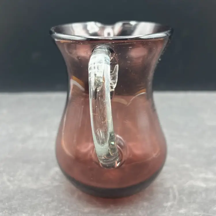 #233B Vintage Hand Blown Open Creamer Pitcher In a Smokey-Purple Color With a Clear Applied Handle. Not Signed