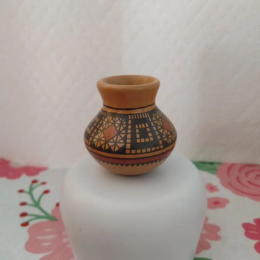Enrique Pedregon Ortiz signed pottery vase. 2.5 h x 2 w.