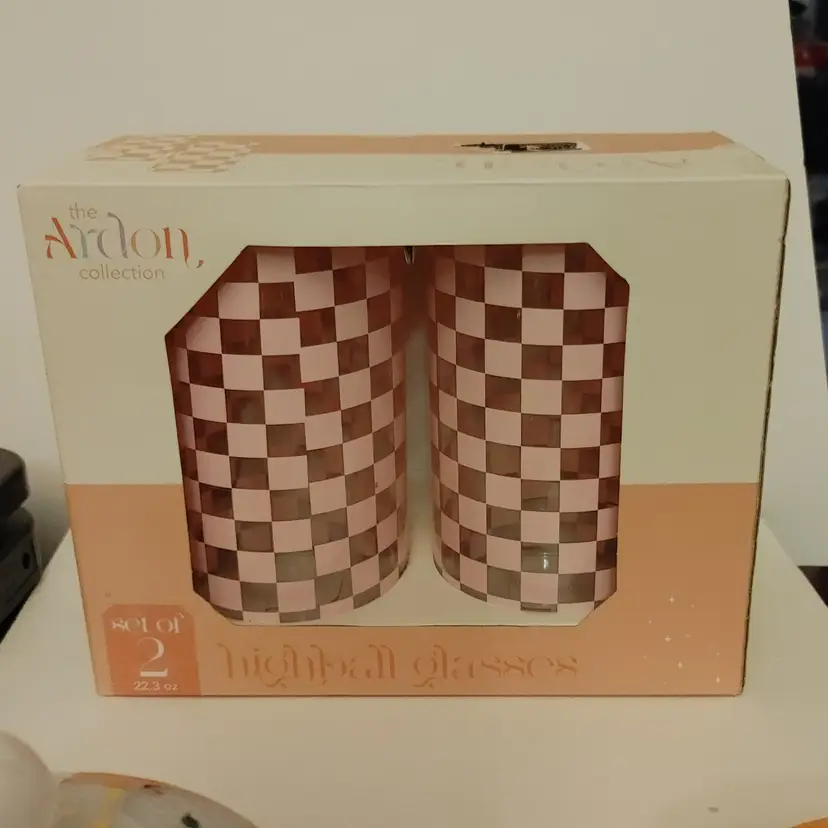 NIB. 2 pink checkered highball glasses. Ardon collection. 6 inches high. No condition issues.