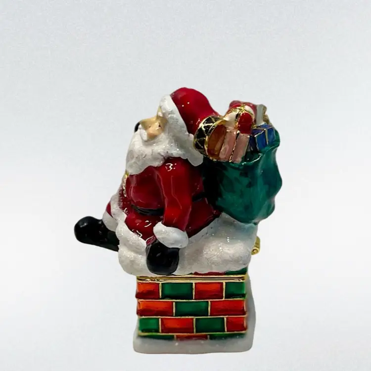 Santa in Chimney Hinged Jeweled Christmas Trinket Box 
3” T x 1-3/4” W