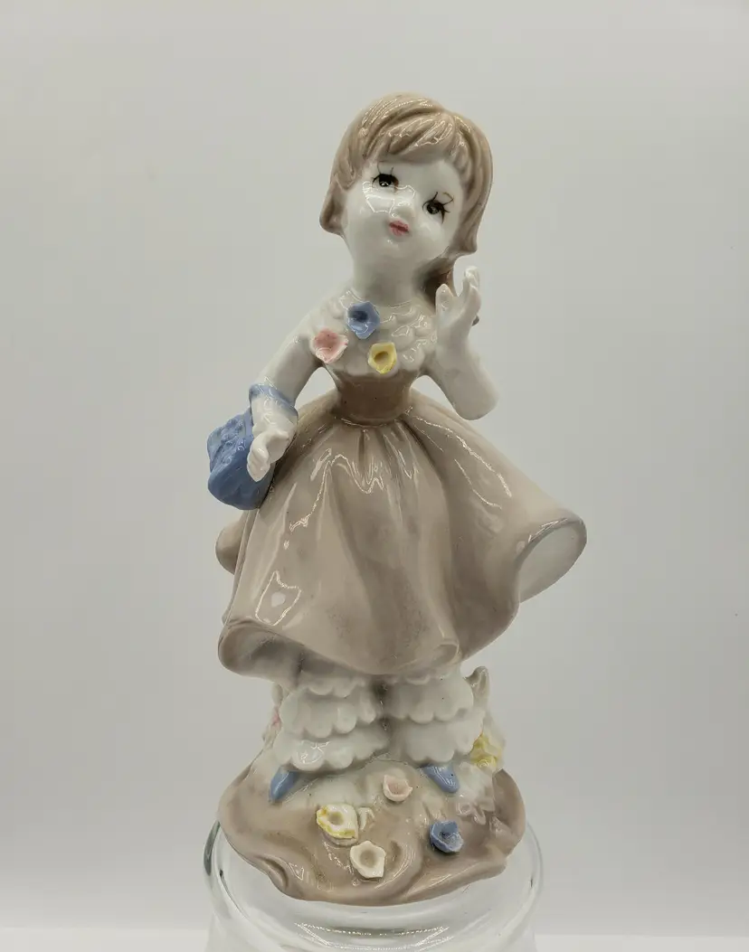 Vintage Girl In Bloomers 1950's Porcelain Figurine Lenwile Ardalt Artware Taiwan. She stands 7" tall and 3" wide.