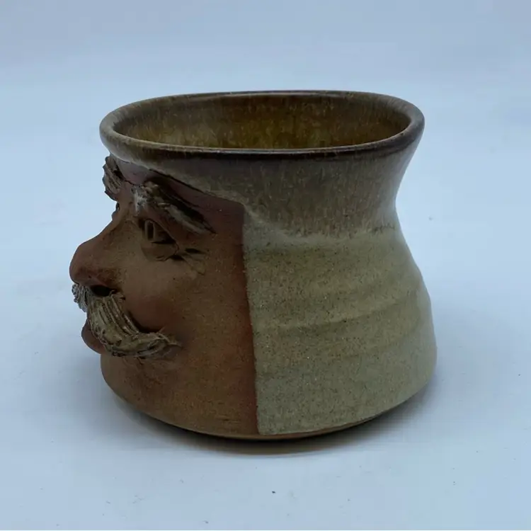 #1726 Handmade stoneware studio pottery mug with a sculpted face.