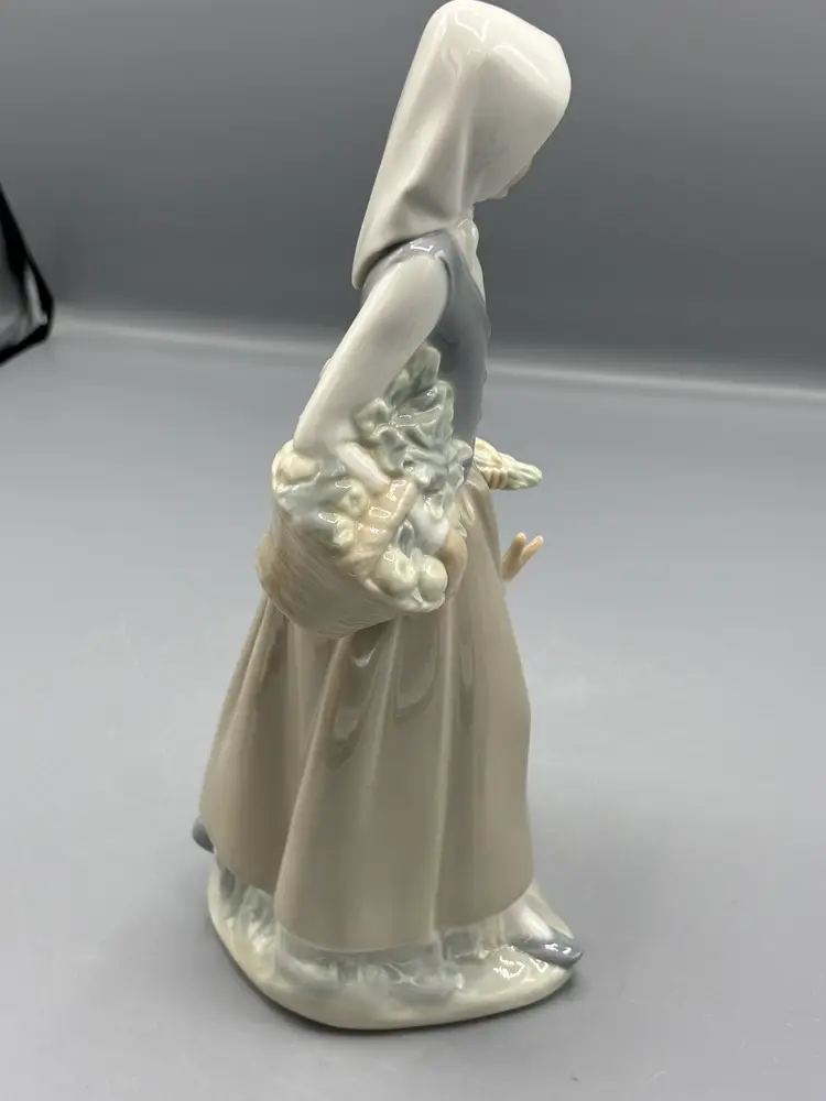 Nao porcelain figure girl with a goose & flowers