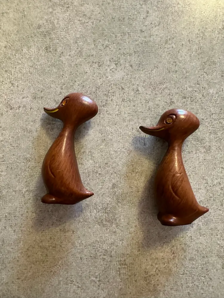 About
Wooden duck figurines with amber rhinestone eyes, Mid-Century Modern