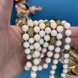 White and green bead necklace