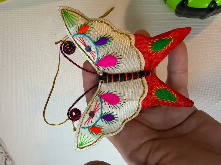 3D Butterfly W/white Colorful Light Pattern And Red On The Button