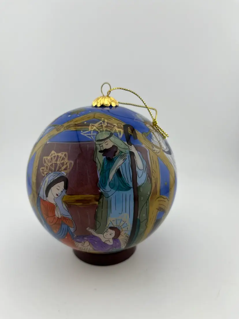 2012 Hand Painted Collectible Ornament-Christmas Nativity. With Beautiful Red Cloth Box with Bone Like Latch.
