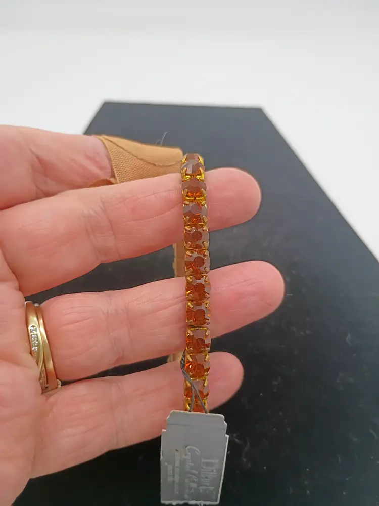 Dillard's Genuine Austrian Crystal Stretch Bracelet Gold Tone Amber Crystals. Brand new