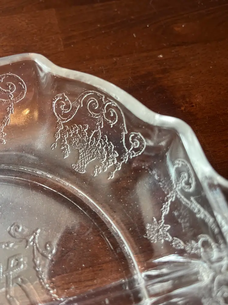 Clear Indiana Lorain glass 4 Part divided relish dish with embossed floral and basket motifs. 
9” X 7”  depression era circa 1930s
