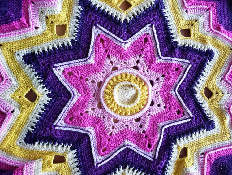 Handmade Crochet Mandala Starburst Baby Blanket in Purples, Yellows, and Pinks