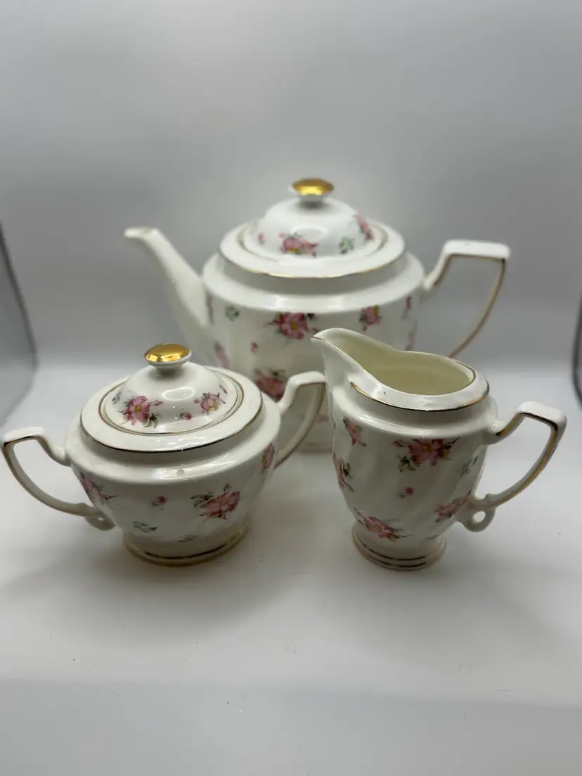 Grace’s Teaware Tea Set: Teapot 7”x 9”, Creamer And Sugar 4.25” Pink Floral Pattern