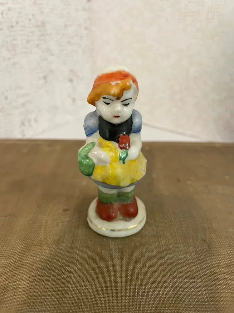 Vintage Miniature Girl holding basket and rose bisqueware type figurine Made in Japan