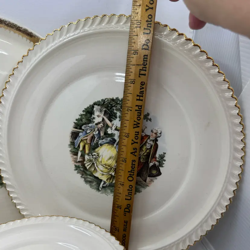 Harker Pottery "Courting Couple" decorative ceramic dinner plate. 10”
