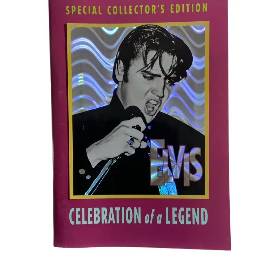 5” By 7” Pink Cover Special Collector's Edition" booklet titled "Celebration of a Legend" featuring Elvis Presley. Hologram Photo It is a commemorative publication, filled with photos and articles about his life and career. Elvis Presley