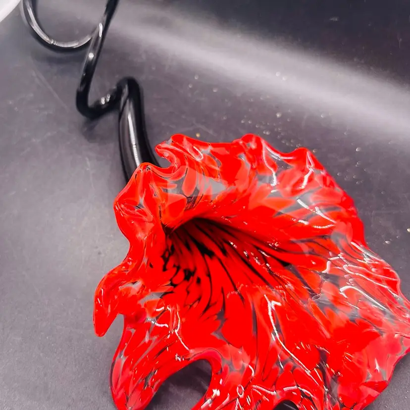 10. Murano-Style hand-blown decorative art glass flower.  Vibrant Red and black with curly stem