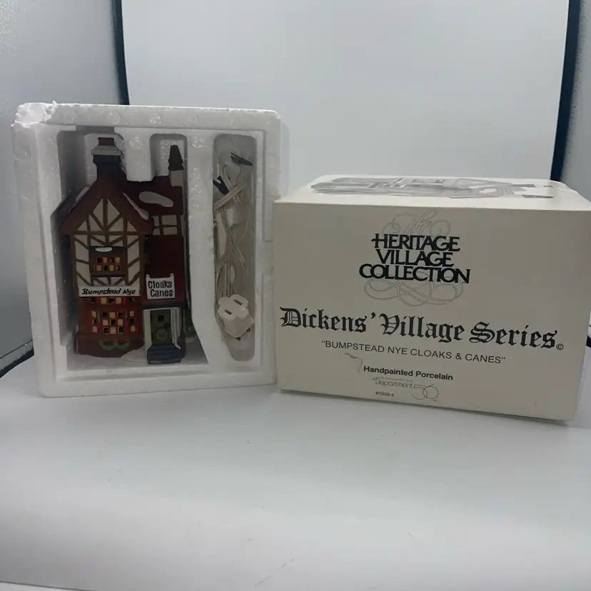 DEPT 56  "BUMPSTEAD NYE CLOAKS & CANES"  *** DICKENS VILLAGE ***