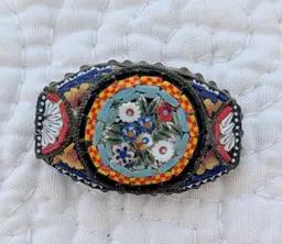 Intricate Antique Italian Floral Micromosaic Brooch with Petite Flowers on a Teal Background
