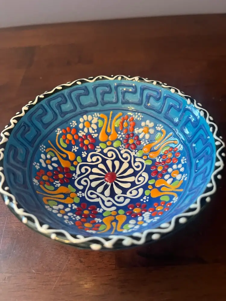 Hand-painted blue ceramic bowl with floral and geometric motifs. Likely from Turkey 5” x 2”